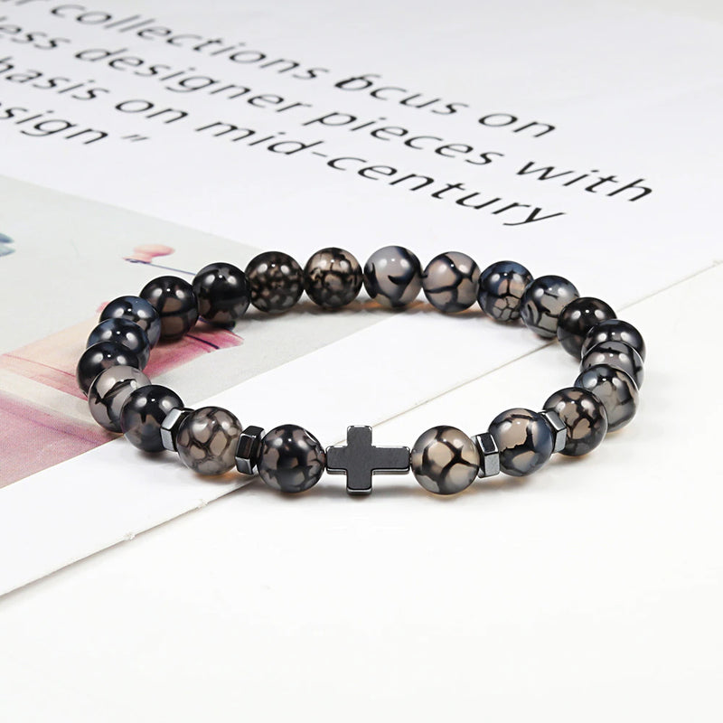 Thompson Luxury Glas-Perlenarmband mit Kreuz “Larry”
